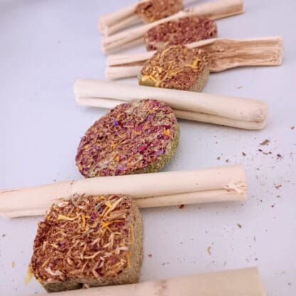 Hanging rabbit treats with calendula, timothy hay, rose, apple sticks and bamboo